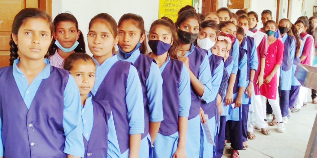 School girls in queue for corona vaccination in ujjain